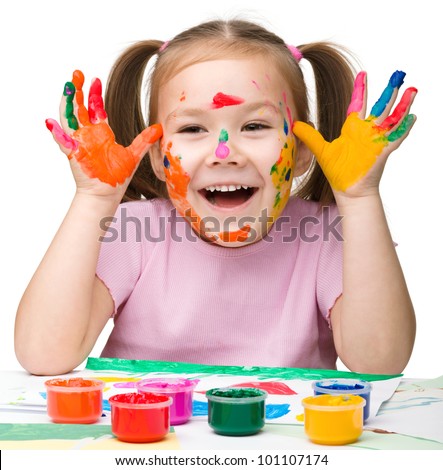 Portrait of a cute cheerful girl with painted hands, isolated over white