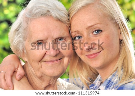 Grandmother and granddaughter. MANY OTHER PHOTOS WITH THIS SENIOR WOMAN IN MY PORTFOLIO.