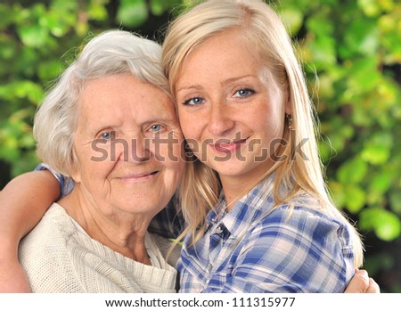 Grandmother and granddaughter. MANY OTHER PHOTOS WITH THIS SENIOR WOMAN IN MY PORTFOLIO.