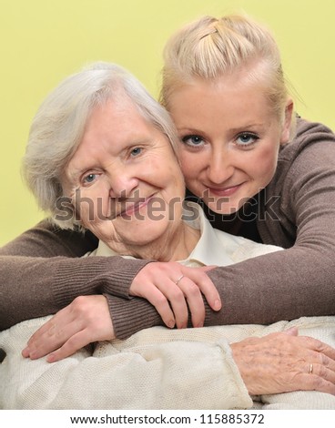 Senior woman with her granddaughter. Happy and smiling. MANY OTHER PHOTOS WITH THIS FAMILY IN MY PORTFOLIO.