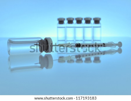 Vials of medications with syringe and needle. MANY OTHER MEDICAL PHOTOS OF VIALS, SYRINGES ETC. IN MY PORTFOLIO
