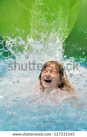 Happy girl in water.