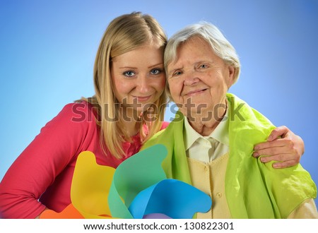 Grandmother and granddaughter, senior and young women. MANY OTHER PHOTOS FROM THIS SERIES IN MY PORTFOLIO.