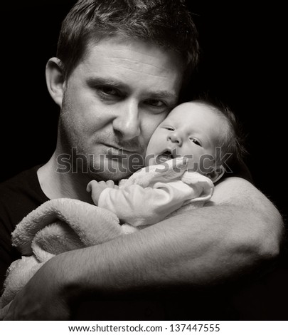 MANY OTHER PHOTOS FROM THIS SERIES IN MY PORTFOLIO. - stock-photo-father-and-his-newborn-baby-many-other-photos-from-this-series-in-my-portfolio-137447555