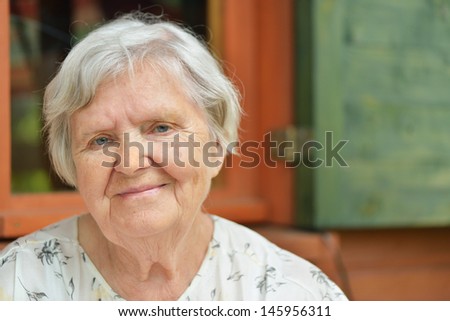 Senior Woman On The Veranda Of His Home. Many Other Photos From This Series In My Portfolio.