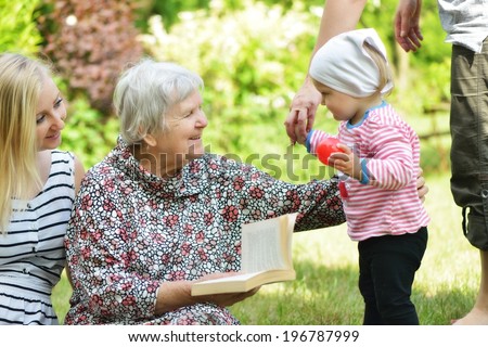 Grandmother and granddaughter. Happy and smiling family. MANY OTHER PHOTOS FROM THIS SERIES IN MY PORTFOLIO.