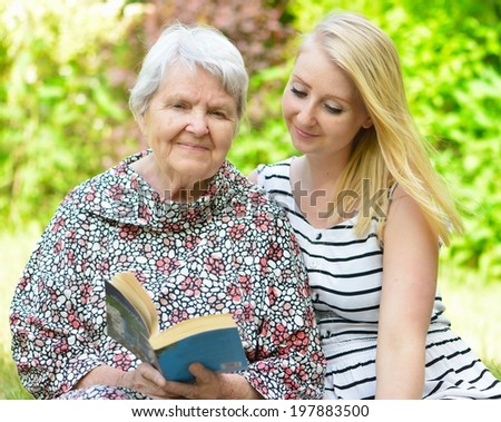 Grandmother and granddaughter. Happy family.  MANY OTHER PHOTOS FROM THIS SERIES IN MY PORTFOLIO.