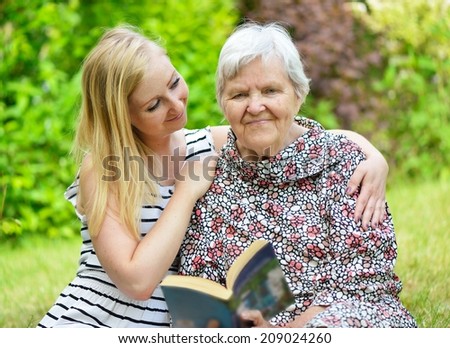 Grandmother and granddaughter. Happy family.  MANY OTHER PHOTOS FROM THIS SERIES IN MY PORTFOLIO.