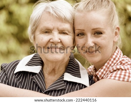 Grandmother and granddaughter. Happy family. Vintage style.