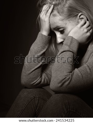 Sad woman. MANY OTHER PHOTOS FROM THIS SERIES IN MY PORTFOLIO.