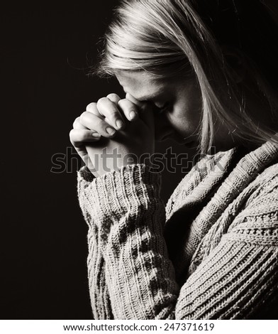 Praying woman. MANY OTHER PHOTOS FROM THIS SERIES IN MY PORTFOLIO.