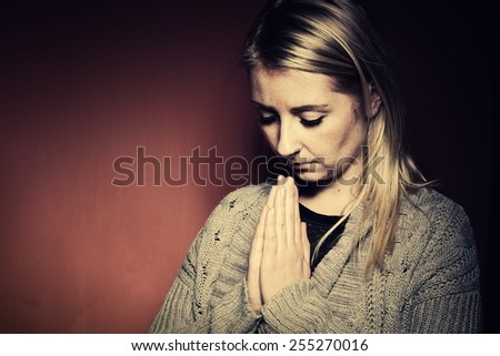 Praying woman.MANY OTHER PHOTOS FROM THIS SERIES IN MY PORTFOLIO.