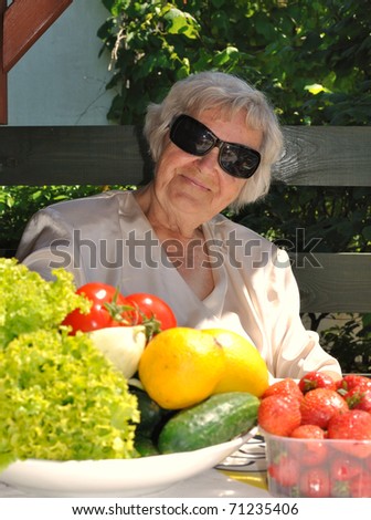 happy grandma in garden