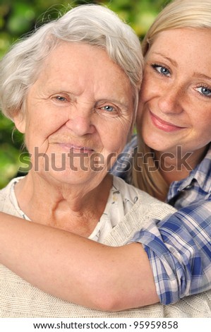 Grandmother and granddaughter. MANY OTHER PHOTOS WITH THIS SENIOR MODEL IN MY PORTFOLIO.