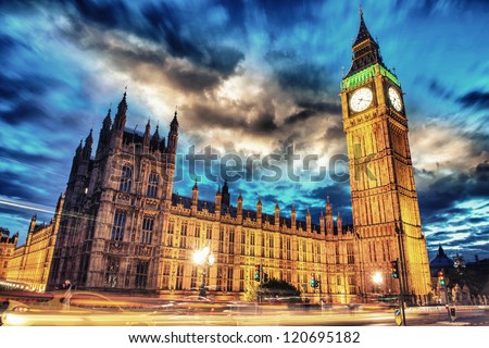 Big Ben and House of Parliament at dusk with clouds from Westminster Bridge - London - UK