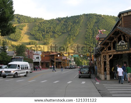 JACKSON HOLE, WYOMING - AUG 10: Tourists walk on the main city street, August 10, 2006 in Jackson Hole, Wyoming. It has been named after Edward Jackson who trapped beaver in the area
