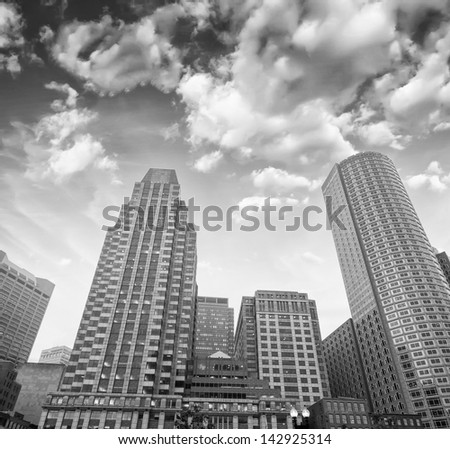 Beautiful black and white view of Boston buildings from street level.