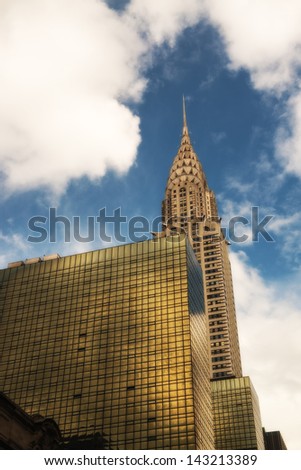 NEW YORK CITY - JUN 11: Wonderful structure of Chrysler Building from street level on June 11, 2013, in NYC. The Chrysler was the tallest building in the world for 11 months until 1931.