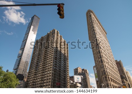 NEW YORK - JUN 12: Flatiron Building on June 12, 2013 in New York. The Flatiron Building is located at 175 Fifth Avenue in the borough of Manhattan, New York City