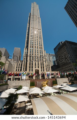 NEW YORK CITY - JUN 15: Rockefeller Center on June 15, 2013 in NYC. Rockefeller Center is a complex of 19 commercial buildings, built by the Rockefeller family, located in Midtown Manhattan