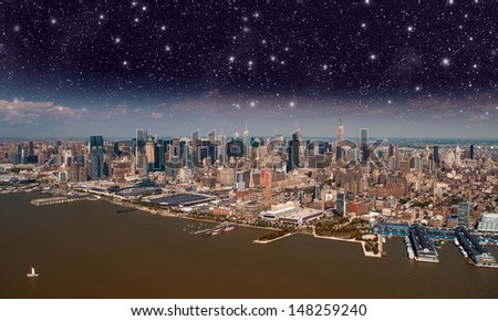 New York City. Night sky above Manhattan skyscrapers.