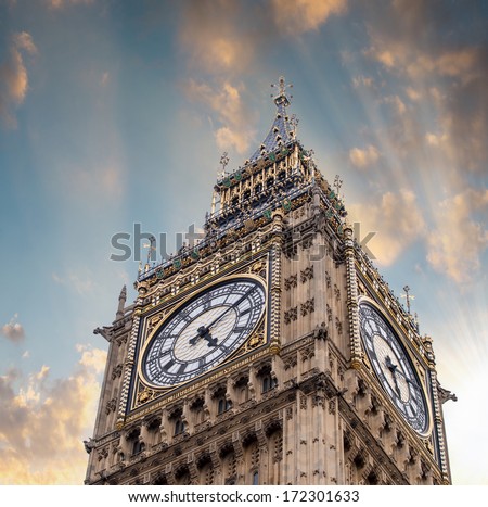 The Big Ben Tower Top in London against dramatic sky.