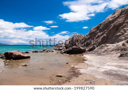 Beautiful seascape with rocks and crystal clear waters.