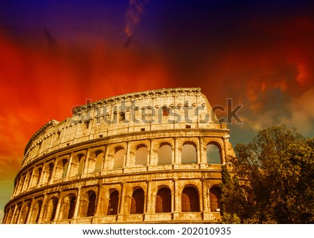 Rome, The Colosseum. Beautiful sunset colors in spring season.