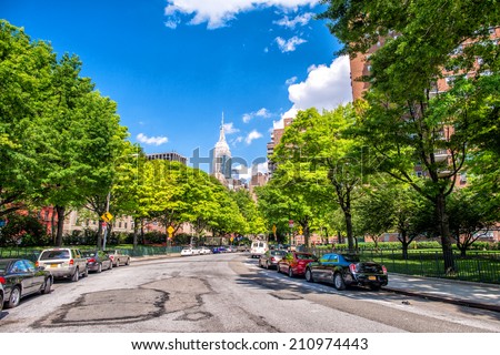 Beutiful view of New York skyline and avenue from Chelsea Park area - Manhattan in summer season.