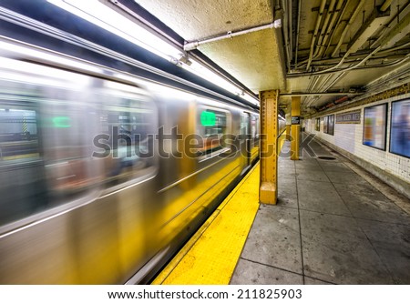 New York City subway train speeding up.