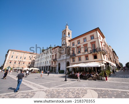 RIMINI, ITALY - SEPTEMBER 9, 2014: Cavour Square on a beautiful summer day. More than 2 million people visit Rimini every year.
