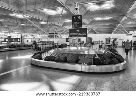 LONDON - SEP 27: Gatwick airport baggage claim on September 27, 2013. Over 34 million passengers passed through Gatwick in 2012