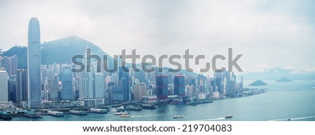 HONG KONG - MAY 12, 2014: Stunning panoramic view of Hong Kong Island on a cloudy day. Last year HK hosted more than 54 million visitors, most of them from the mainland.