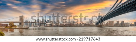 New York City - Stunning panoramic view of Brooklyn and Manhattan Bridge with skyline.