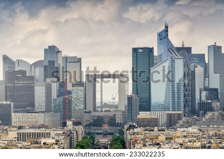 Business district of Paris. La Defense, aerial view on a cloudy day.