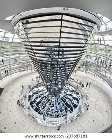 BERLIN, GERMANY - JUN 20: People visit the Reichstag dome at the German parliament August 20, 2012 in Berlin, Germany.