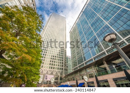 LONDON - SEPTEMBER 28, 2013: Buildings of Canary Wharf as seen from street level. Canary Wharf is a major business district located in Tower Hamlets, London.