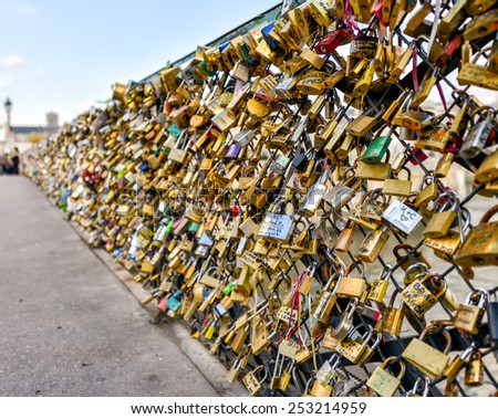 PARIS - DEC 1: Love padlocks at Pont de l\'Archeveche on December 1, 2012, in Paris. The thousands of locks of loving couples symbolize love forever