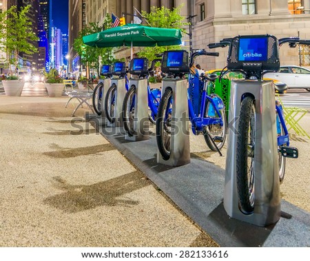 NEW YORK CITY - JUNE 8, 2013: New blue CitiBikes lined up in Manhattan downtown. Citi Bike is the largest bike sharing program in the United States