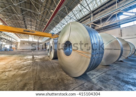 Steel coils inside a factory.