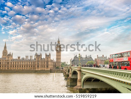 London, England. Double Decker bus crossing Westminster Bridge.