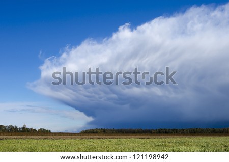 Wall Cloud: Horizontal image of a large Wall Cloud that was part of a strong cold front passing through Minnesota.