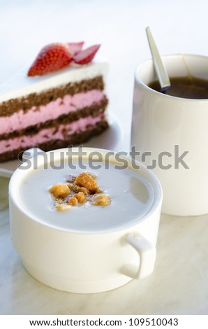 creamy mushroom soup with cake and coffee
