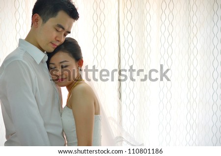 asian bride and groom
