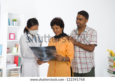 indian punjabi family senior doctor appointment medical checkup