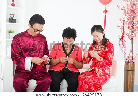 chinese family celebrating lunar new year