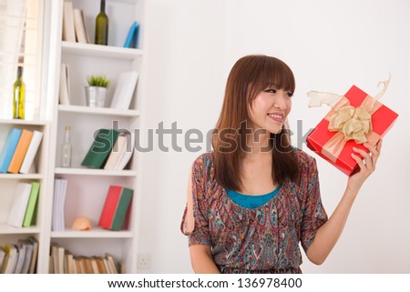 japanese woman happy receiving gift with lifestyle background
