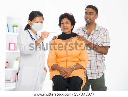 indian punjabi senior medical checkup with an asian female doctor indian punjabi senior medical checkup with an asian female doctor