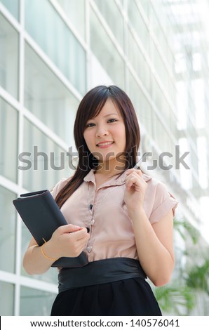 asian chinese female student in formal wear A portrait of an Asian college student on campus