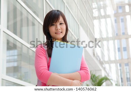 A portrait of an Asian college female student on campus A portrait of an Asian college student on campus